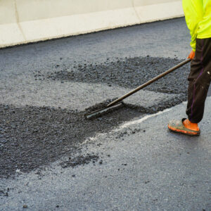The,Highway,Construction,Site,Is,Paving,The,New,Asphalt,Pavement.