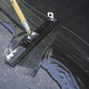 Man,Sealing,Asphalt,Driveway/sealcoating,Selective,Focus