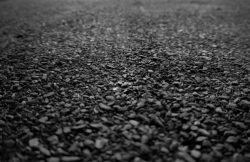 Bitumen-covered,Temporary,Raised,Pavement,Markers,On,A,Road,After,Resealed