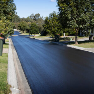 Suburban,Road,Resurfaced,With,Fresh,Asphalt.,Construction,Of,New,Tar