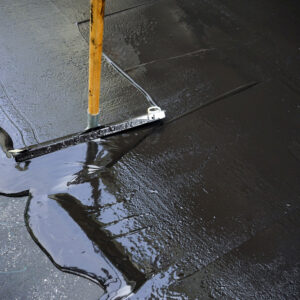 Man,Sealing,Asphalt,Driveway/sealcoating,Selective,Focus